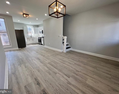 5744 Delancey Street - Photo Thumbnail 2