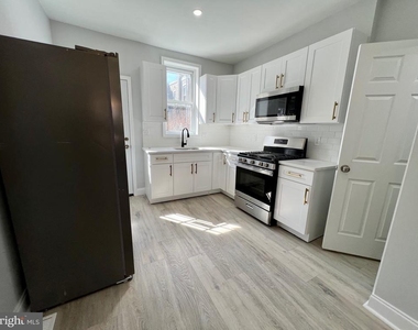 5744 Delancey Street - Photo Thumbnail 3
