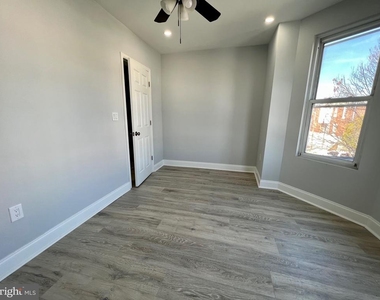 5744 Delancey Street - Photo Thumbnail 8