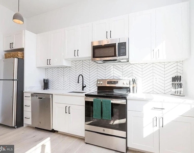 415 Saint Paul Street - Photo Thumbnail 1