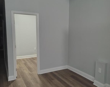 1114 N Bond Street - Photo Thumbnail 1