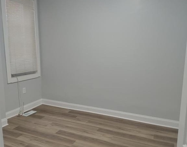 1114 N Bond Street - Photo Thumbnail 6