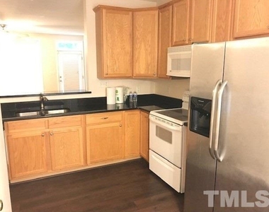 5504 Bradford Pear Court - Photo Thumbnail 3
