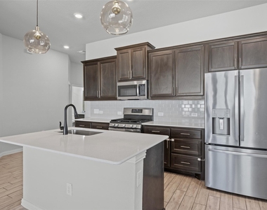 12900 Bloomington Dr - Photo Thumbnail 5