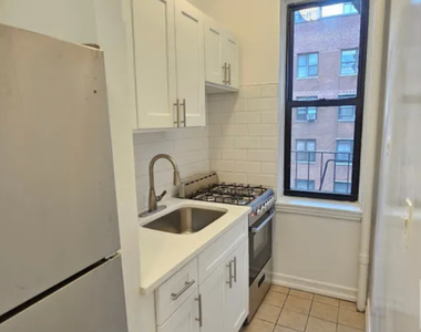 E 55 St - Photo Thumbnail 2