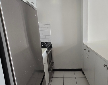 East 83 Street - Photo Thumbnail 2