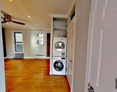 East 100th Street - Photo Thumbnail 7