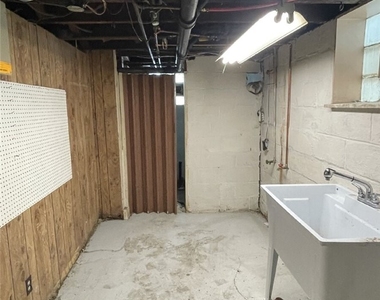 7442 Irvine St - Photo Thumbnail 16