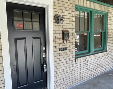 7442 Irvine St - Photo Thumbnail 1
