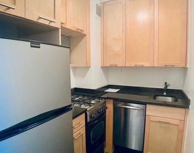 East 36 Street - Photo Thumbnail 7