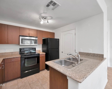 5302 E Van Buren Street - Photo Thumbnail 5