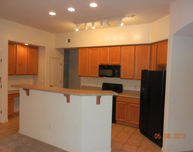 11000 N 77th Place - Photo Thumbnail 6
