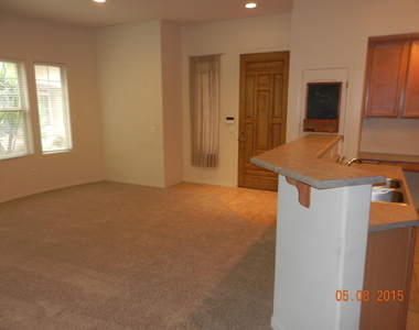 11000 N 77th Place - Photo Thumbnail 4