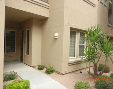 11000 N 77th Place - Photo Thumbnail 2