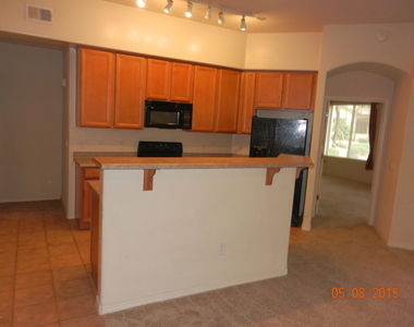 11000 N 77th Place - Photo Thumbnail 5
