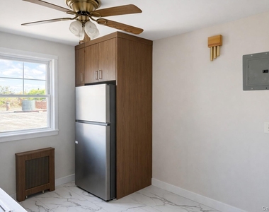 6955 78th Street - Photo Thumbnail 2