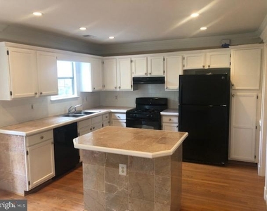 9655 Eaton Woods Place - Photo Thumbnail 5