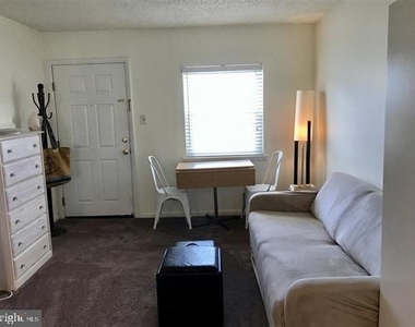111 S Dudley Avenue - Photo Thumbnail 3