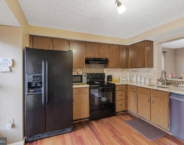 6121 Cedar Wood Drive - Photo Thumbnail 1