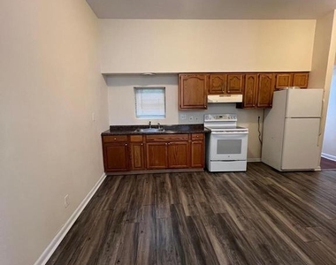 1423 W Fayette Street - Photo Thumbnail 2