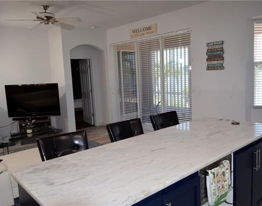 1702 Emerald Cove Drive - Photo Thumbnail 3