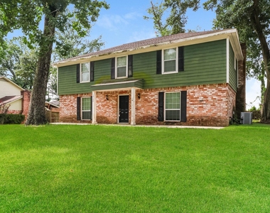 10122 Woodhollow Drive - Photo Thumbnail 1