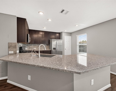 8932 Hollister Commons Lane - Photo Thumbnail 16