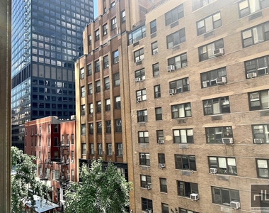 East 56 Street - Photo Thumbnail 6