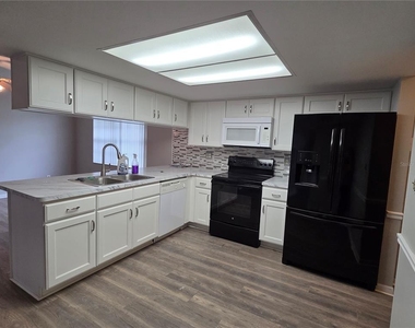 7005 Pin Cherry Lane - Photo Thumbnail 5