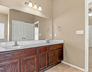 7008 Faxon Drive - Photo Thumbnail 3