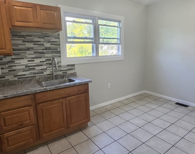 279 Captain Thomas Boulevard - Photo Thumbnail 7