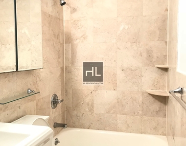E 13th St. - Photo Thumbnail 6