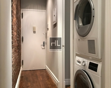 E 13th St. - Photo Thumbnail 2