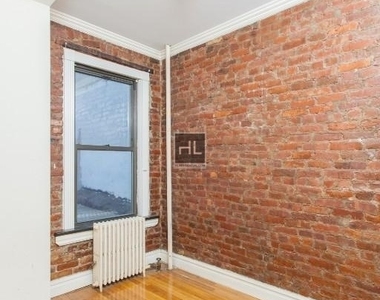 E 13th St. - Photo Thumbnail 4