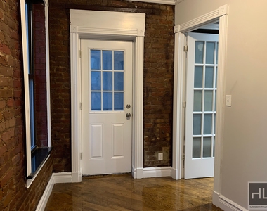 E 13th St. - Photo Thumbnail 1