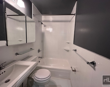 E 13th St. - Photo Thumbnail 2