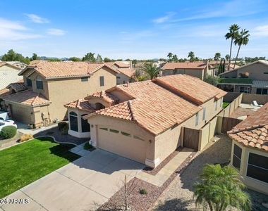 9733 W Runion Drive - Photo Thumbnail 1