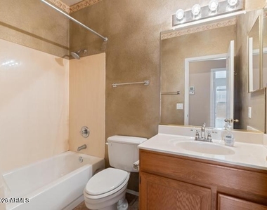 9733 W Runion Drive - Photo Thumbnail 12