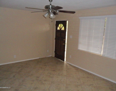 11139 W Elk Avenue - Photo Thumbnail 1