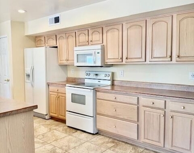 11801 N Coggins Drive - Photo Thumbnail 1