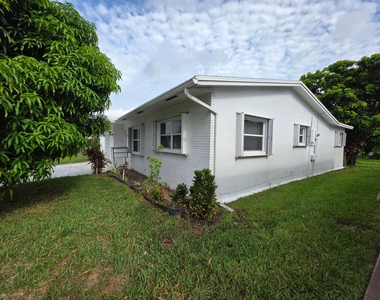 7195 Nw 9th Court - Photo Thumbnail 1