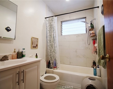 1224 N Mansfield - Photo Thumbnail 5