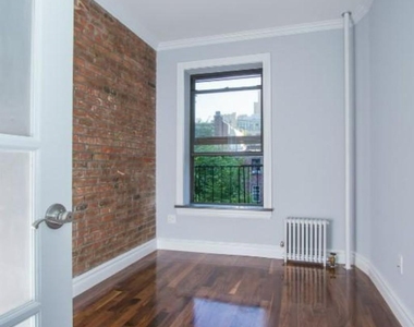 W 21st St. - Photo Thumbnail 2