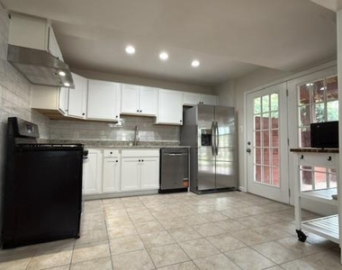 5602 Kings Park Drive - Photo Thumbnail 2