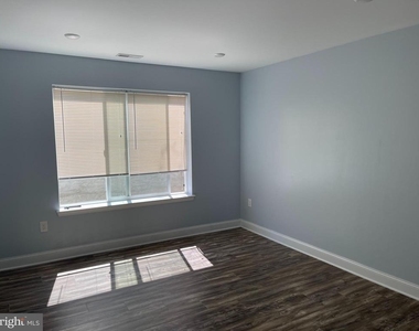 1257 N Newkirk Street - Photo Thumbnail 3