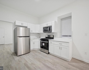 1418 W Erie Avenue - Photo Thumbnail 1