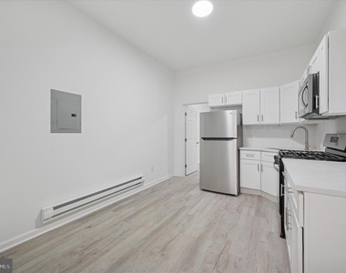 1418 W Erie Avenue - Photo Thumbnail 2