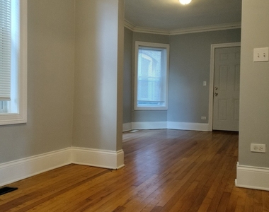 7408 S Eberhart Avenue - Photo Thumbnail 4