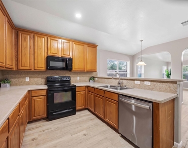11609 Spill Creek Drive - Photo Thumbnail 5