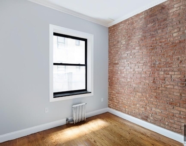 E 100th St - Photo Thumbnail 4
